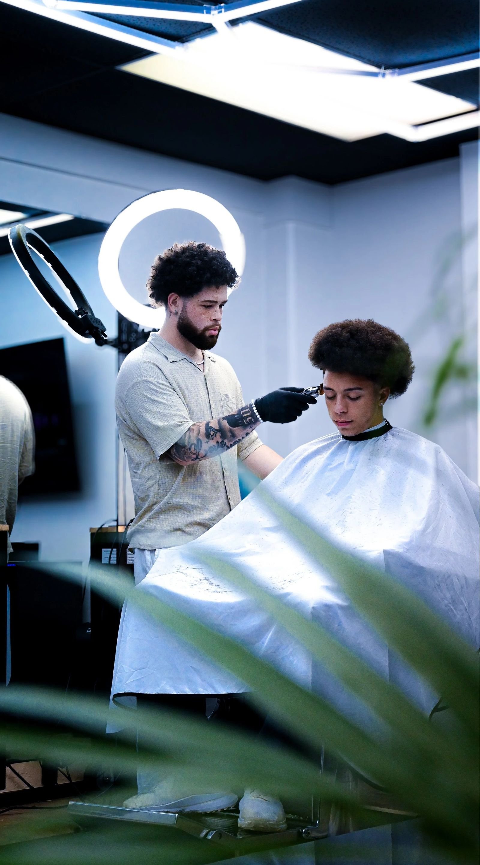 Barber giving a fresh fade at Madison Barbershop in Keizer